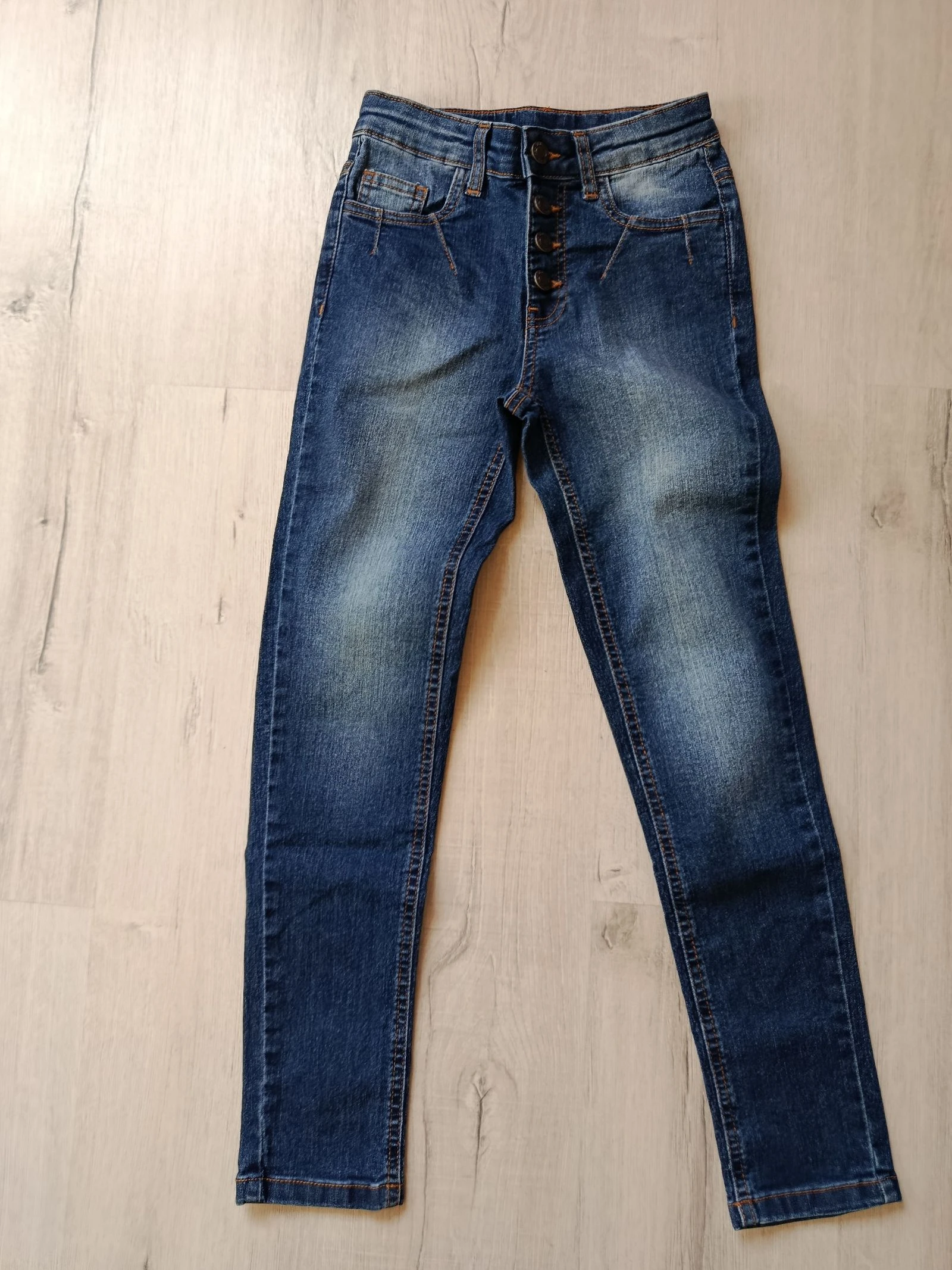 Jean marque John baner taille 11 ans 